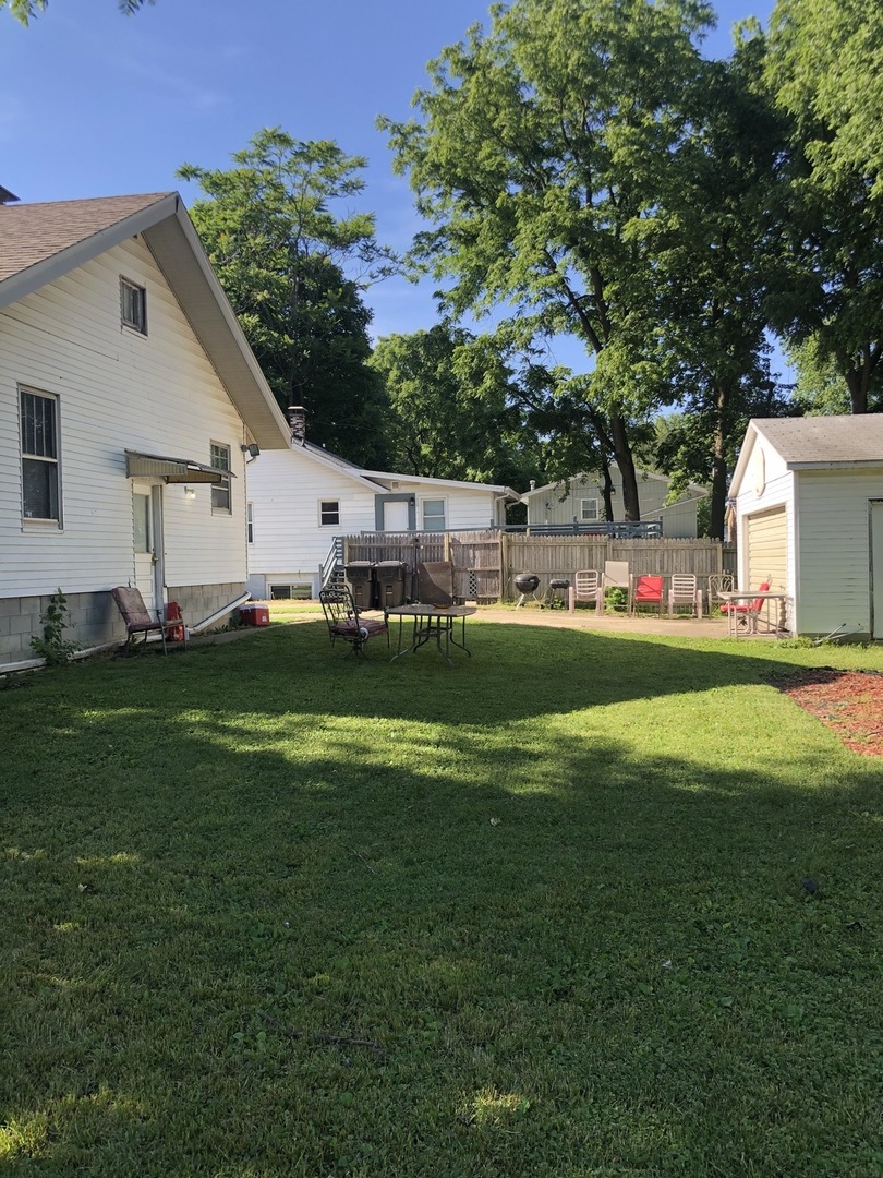 300 North Maple Street Normal, IL 61761 - Photo 3 of 18 a house view with a outdoor space