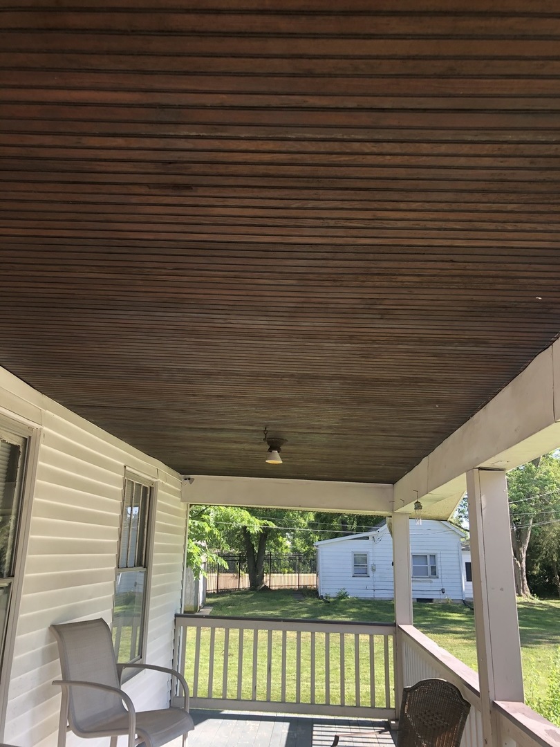 300 North Maple Street Normal, IL 61761 - Photo 4 of 18 a view of porch with a bench