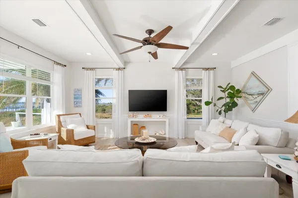 a kitchen with sink stove and cabinets