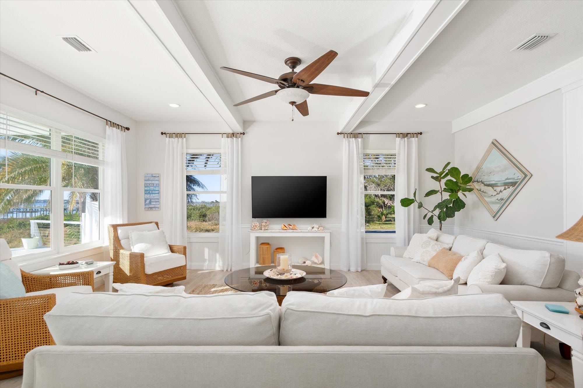 345 Micklers Road St. Augustine, FL 32080 - Photo 11 of 100 a living room with furniture and a flat screen tv