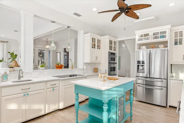 a bedroom with a large bed and a couch