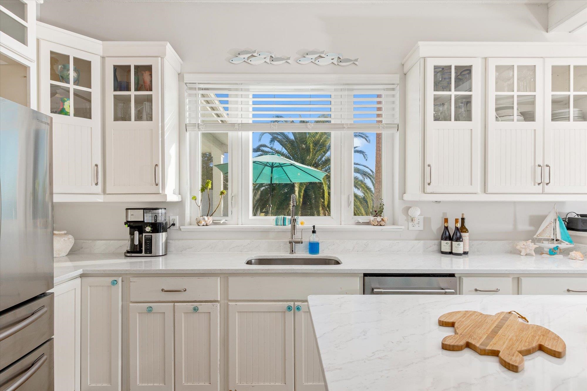 345 Micklers Road St. Augustine, FL 32080 - Photo 17 of 100 a kitchen with a sink cabinets and window