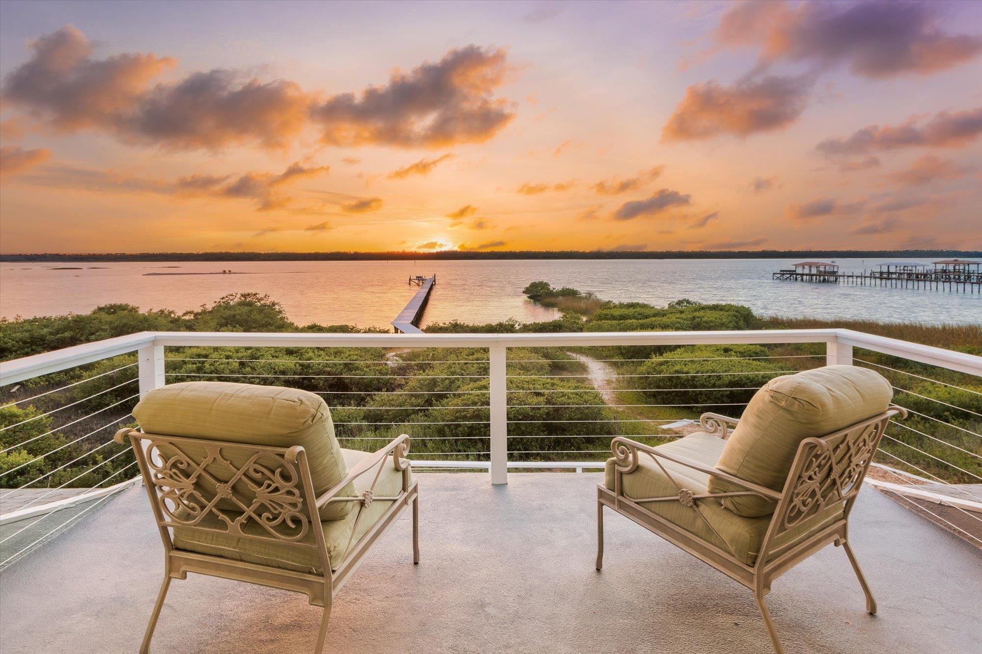 345 Micklers Road St. Augustine, FL 32080 - Photo 26 of 100 a view of a chairs and table in the terrace