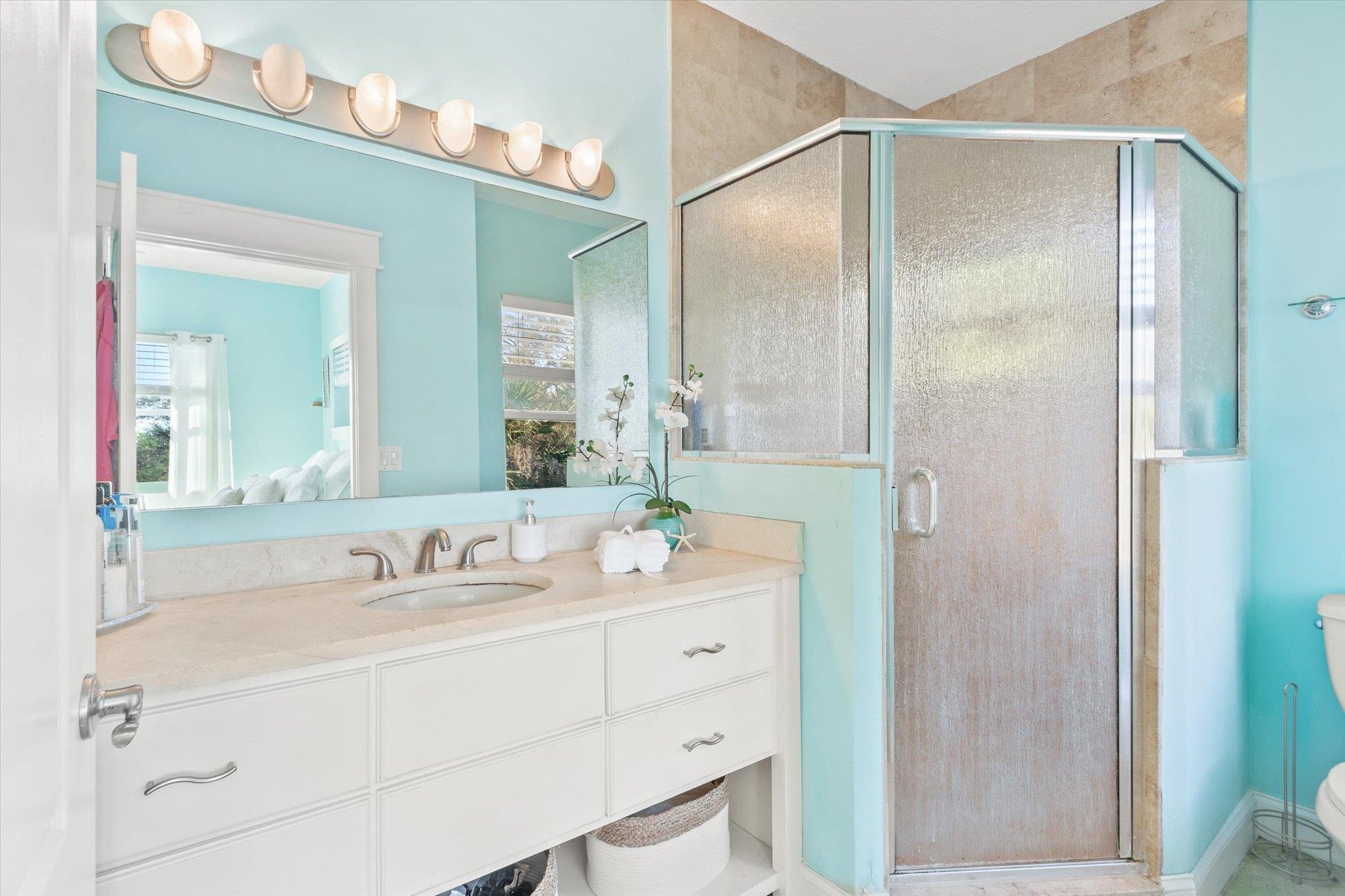 345 Micklers Road St. Augustine, FL 32080 - Photo 35 of 100 a bathroom with a double vanity sink mirror and double