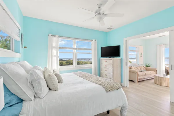 a view of multiple houses with a yard