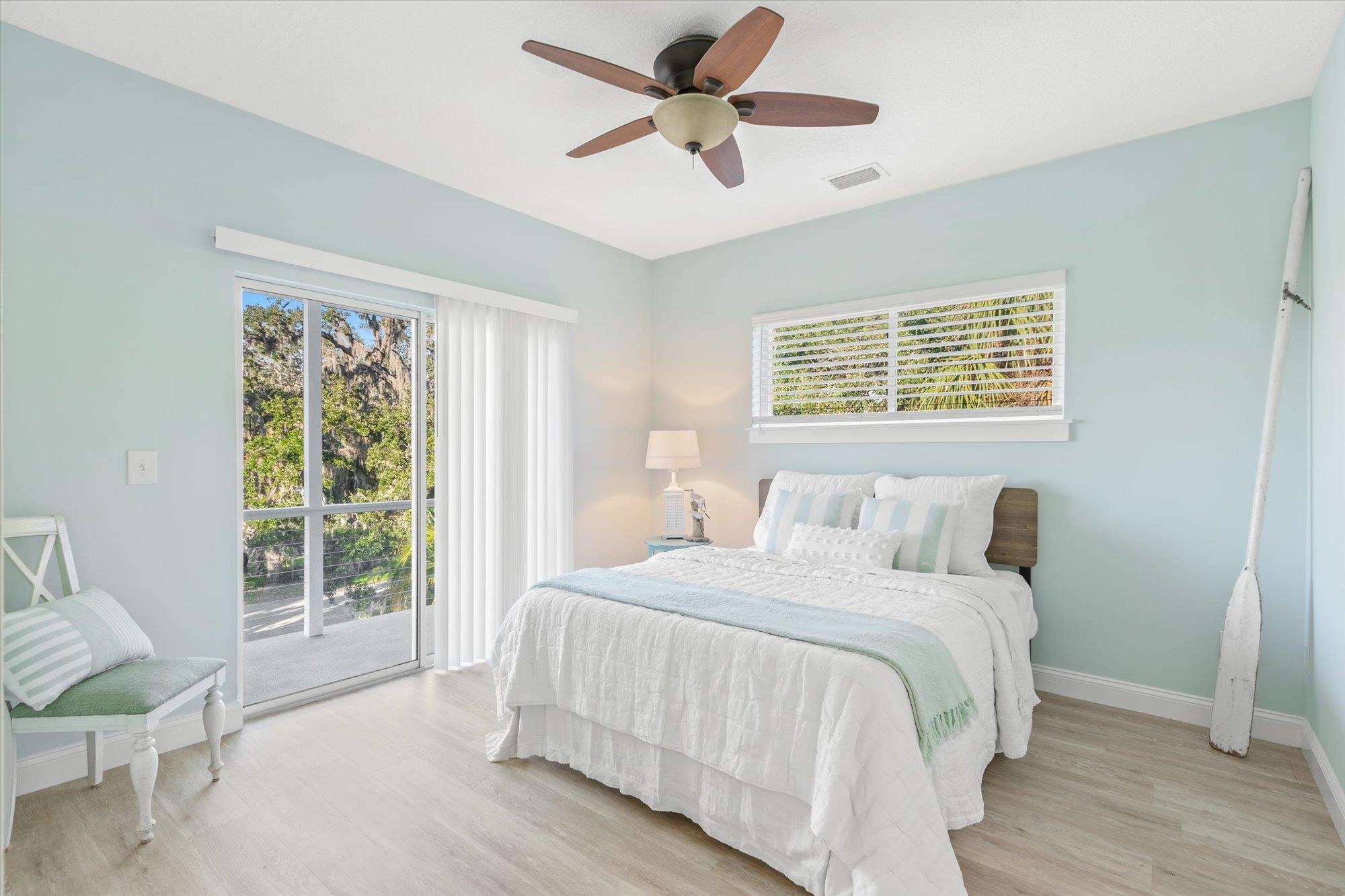 345 Micklers Road St. Augustine, FL 32080 - Photo 41 of 100 a bedroom with a bed and a window
