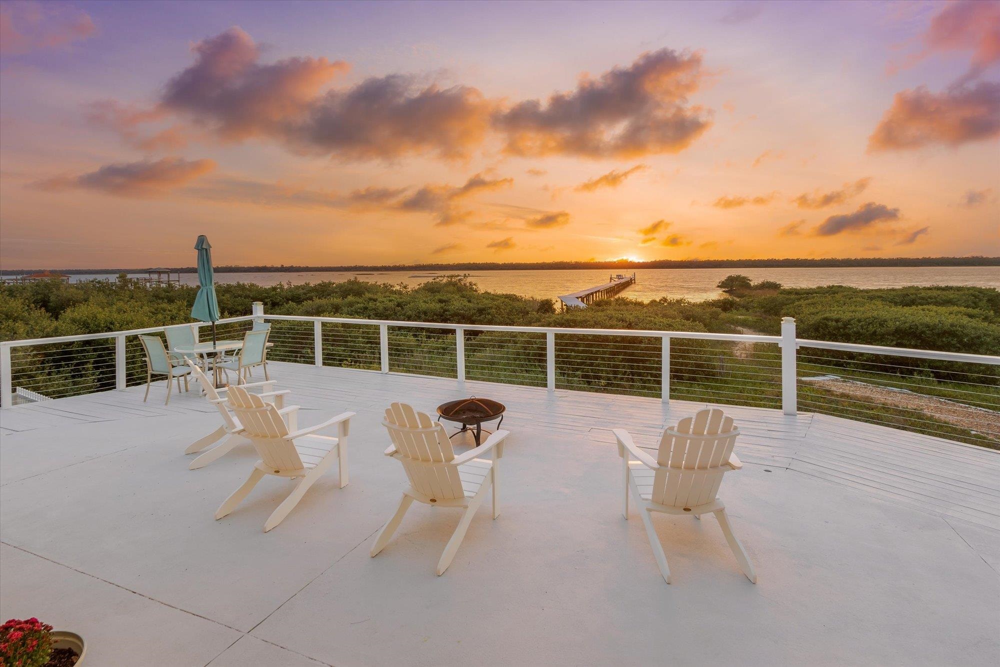 345 Micklers Road St. Augustine, FL 32080 - Photo 64 of 100 a view of a lake with a sitting space