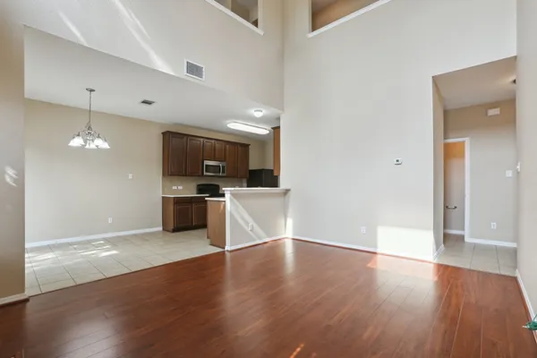 a view of a kitchen with a sink and a stove top oven