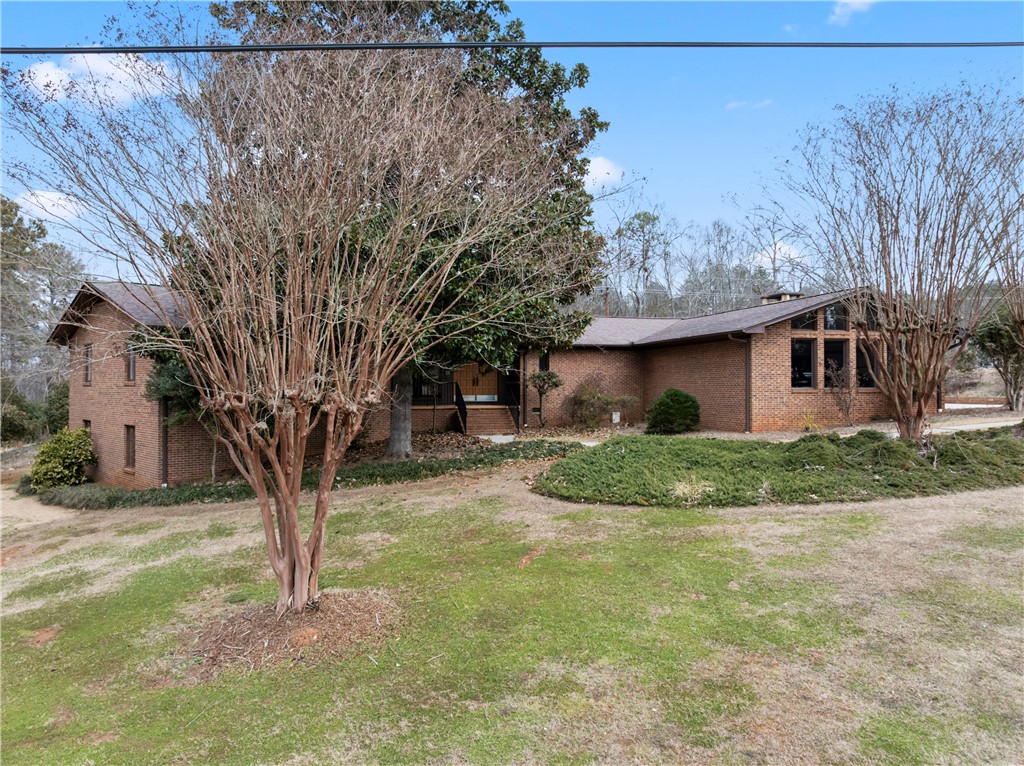 501 Westminster Drive Pendleton, SC 29670 - Photo 1 of 50 Contemporary Brick home perched on a knoll