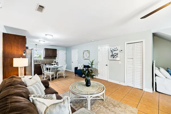 a living room with furniture and a gate