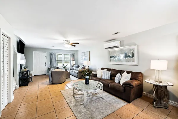 a living room with furniture and a couch