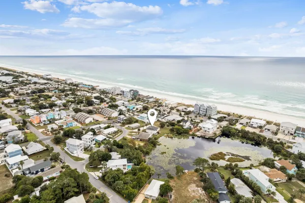 a view of a glass door with a lake view