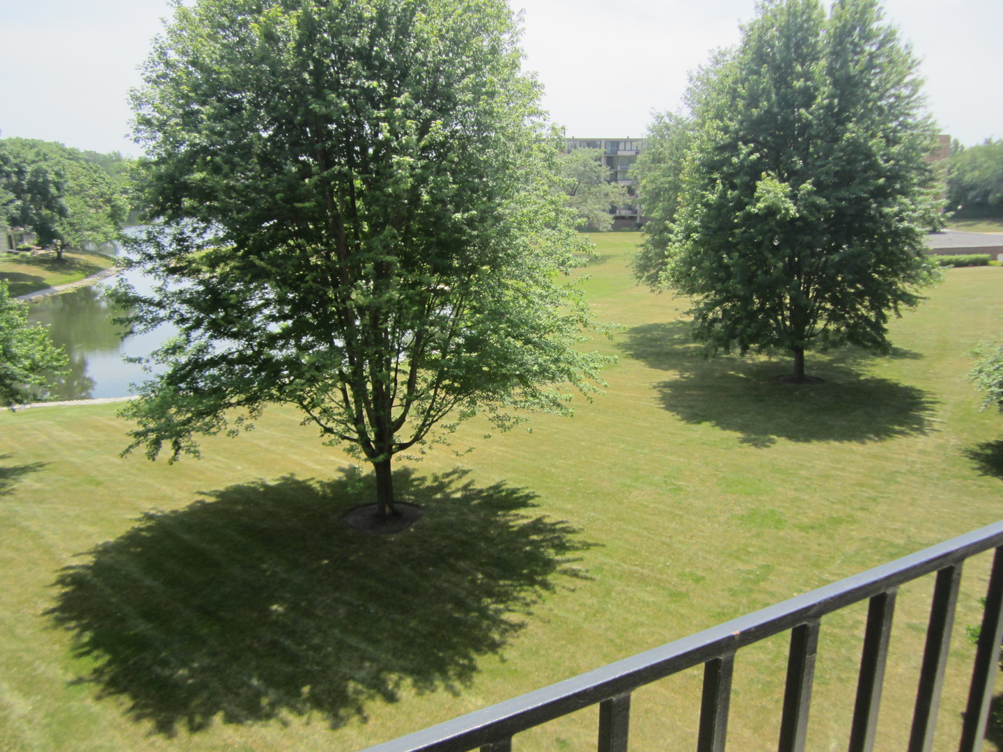 15 Bar Harbour Road, Unit 4G Schaumburg, IL 60193 - Photo 20 of 21 a view of lake from a balcony