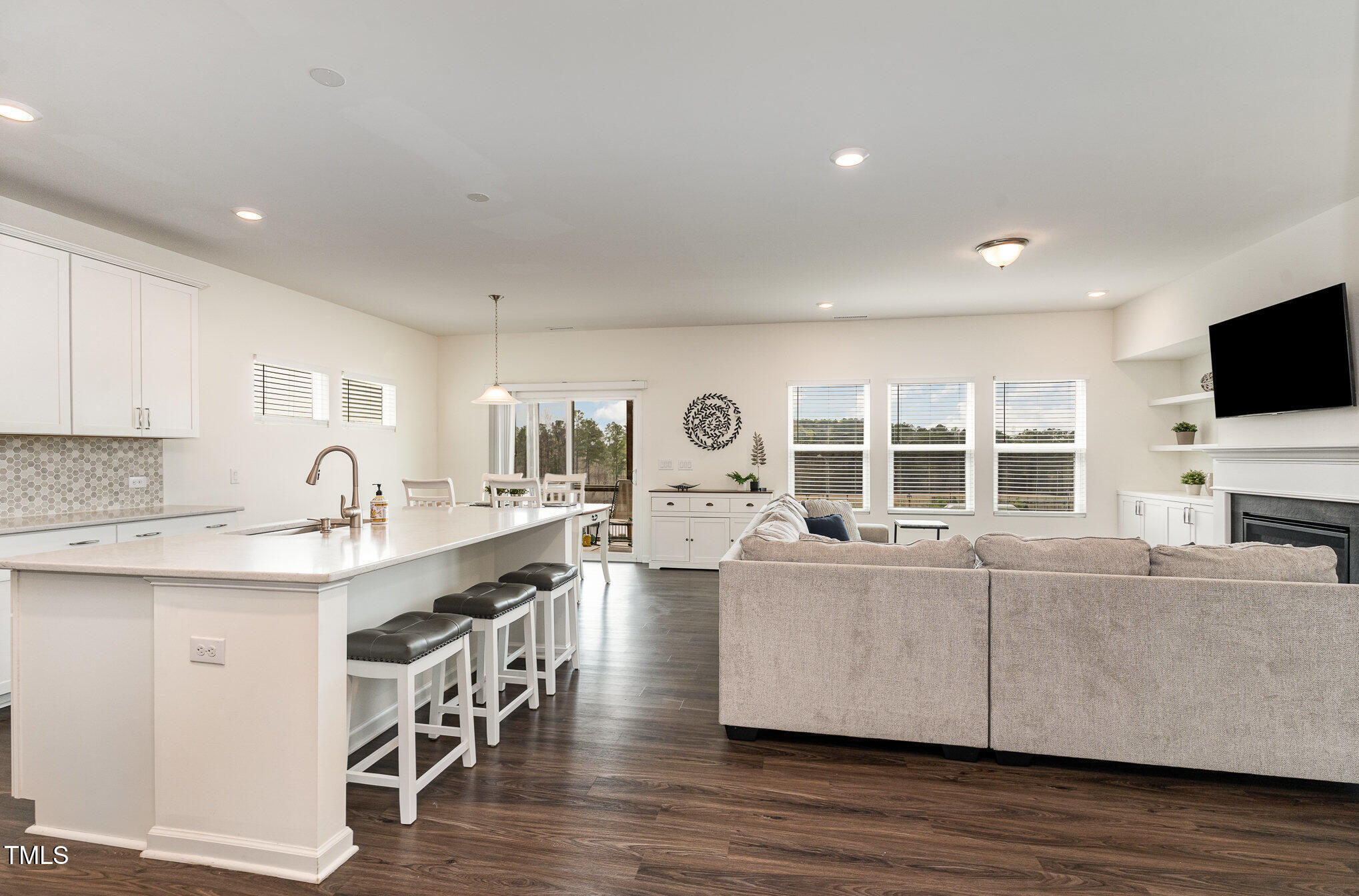 1040 Lippincott Road Durham, NC 27703 - Photo 11 of 43 a living room with furniture and flat screen tv