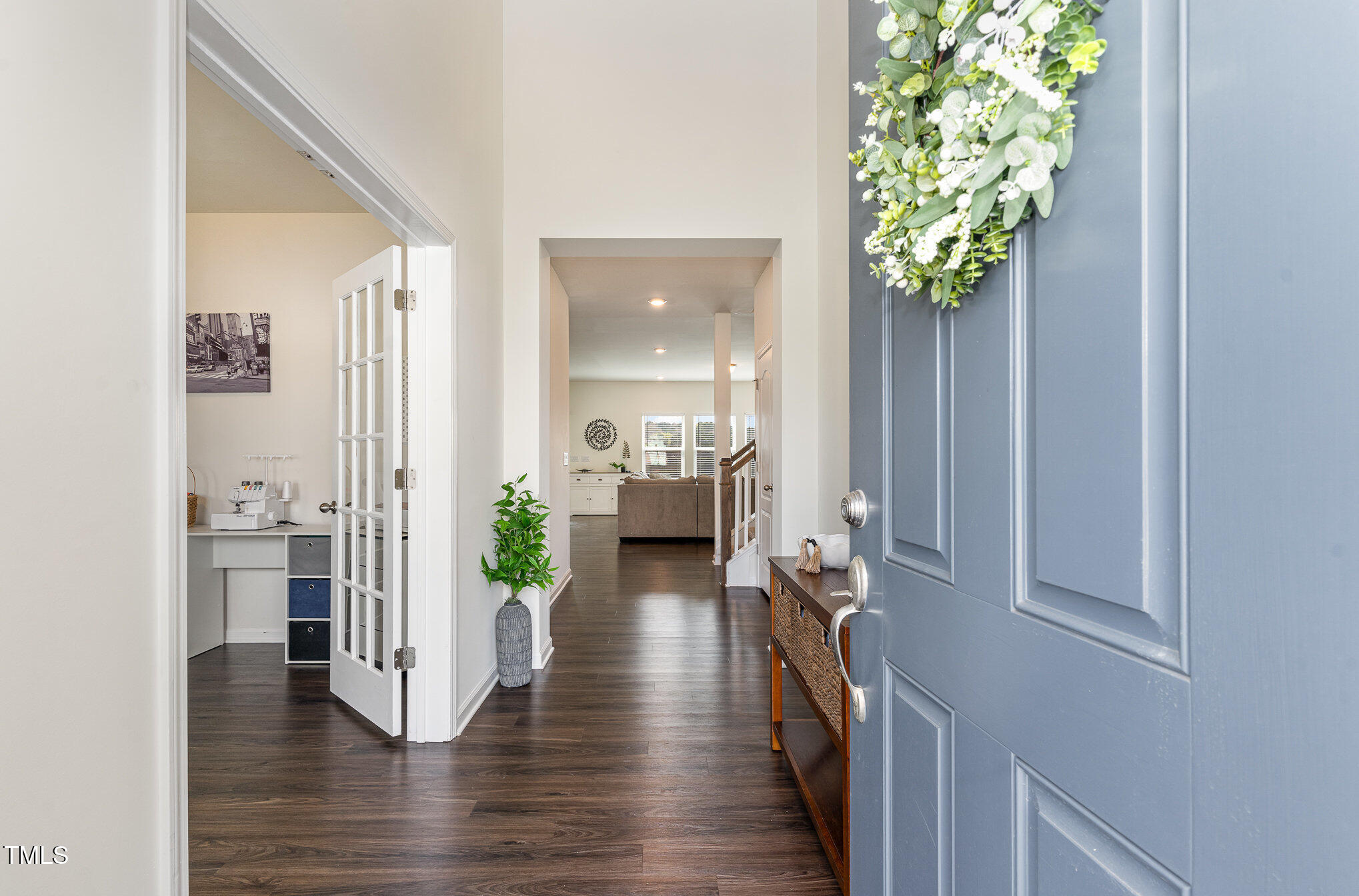 1040 Lippincott Road Durham, NC 27703 - Photo 2 of 43 a view of a hallway view with wooden floor and a living room