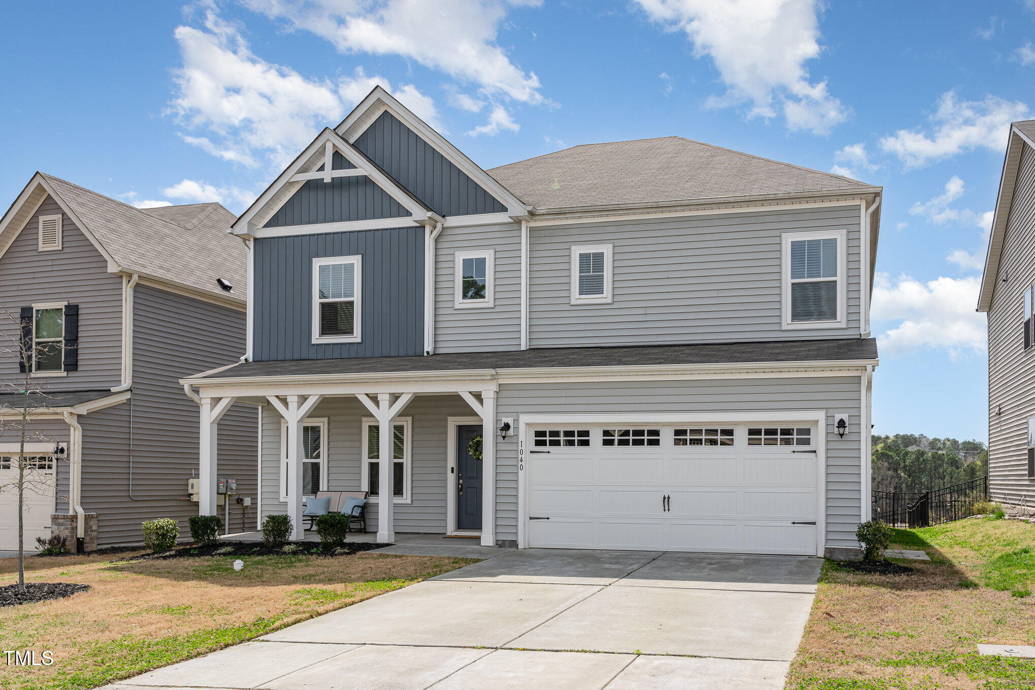 1040 Lippincott Road Durham, NC 27703 - Photo 31 of 43 a front view of a house with garage