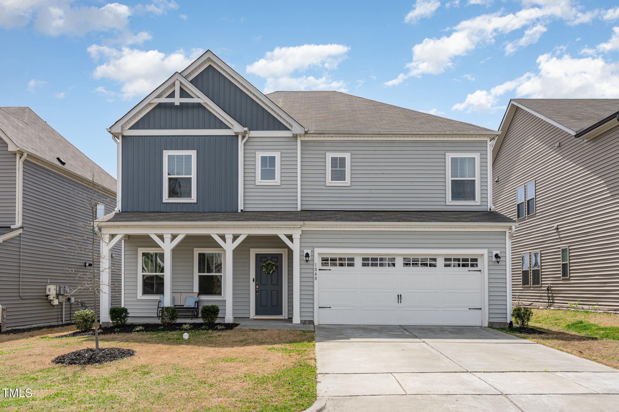 1040 Lippincott Road Durham, NC 27703 - Photo 32 of 43 a front view of a house with glass windows