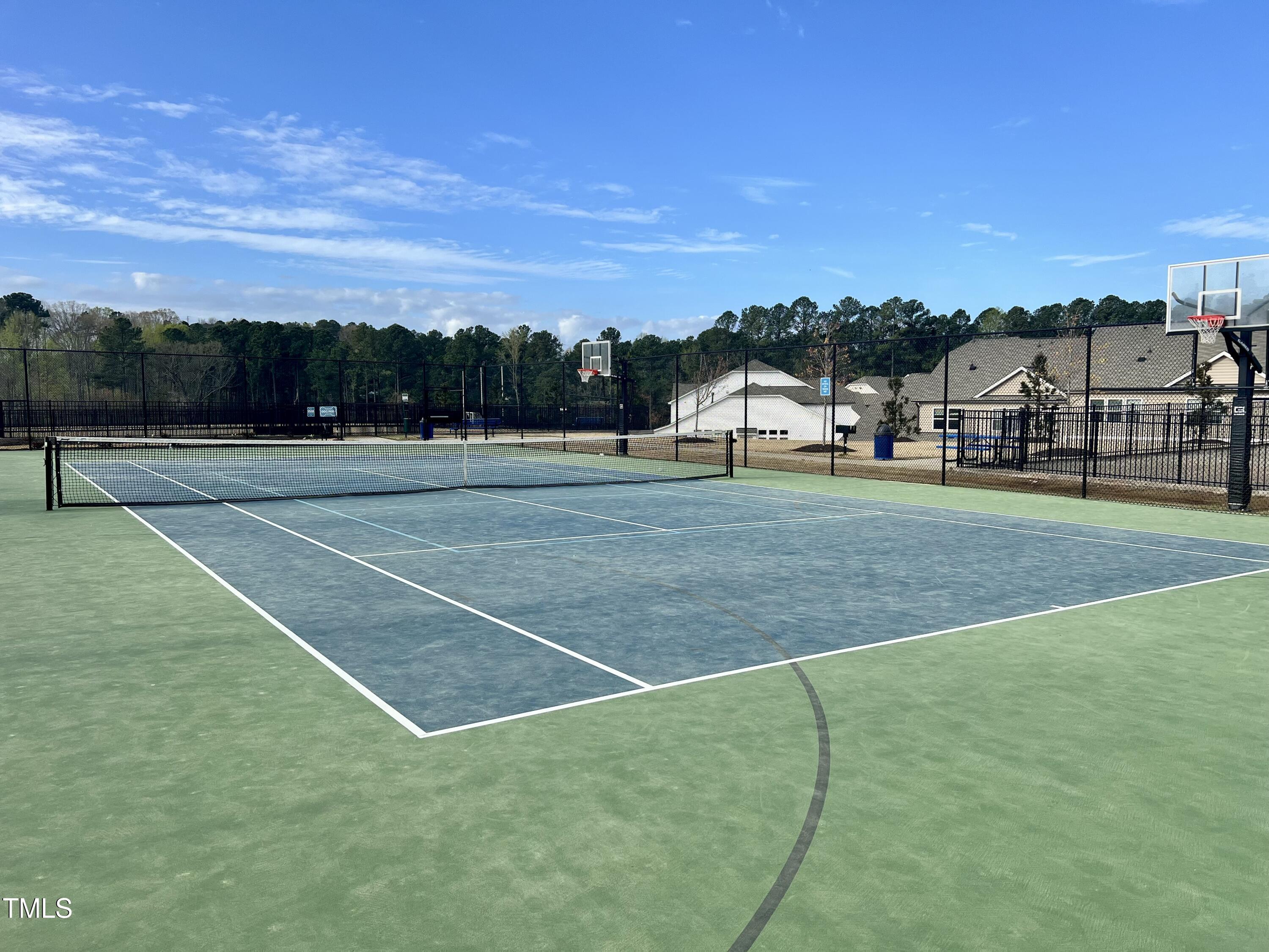 1040 Lippincott Road Durham, NC 27703 - Photo 38 of 43 a view of an outdoor space and tennis court