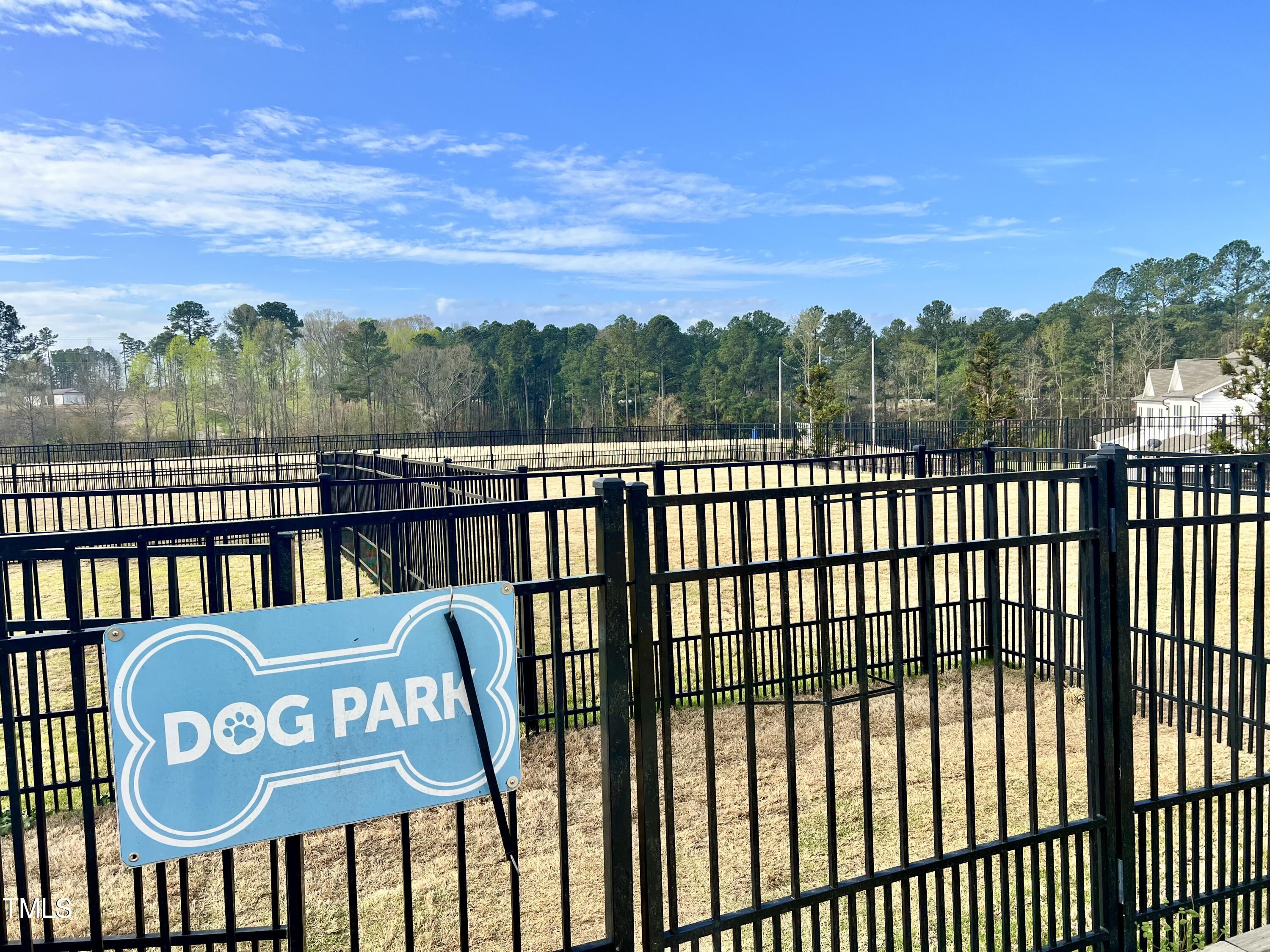 1040 Lippincott Road Durham, NC 27703 - Photo 43 of 43 a view of a wooden fence and a floor to ceiling window
