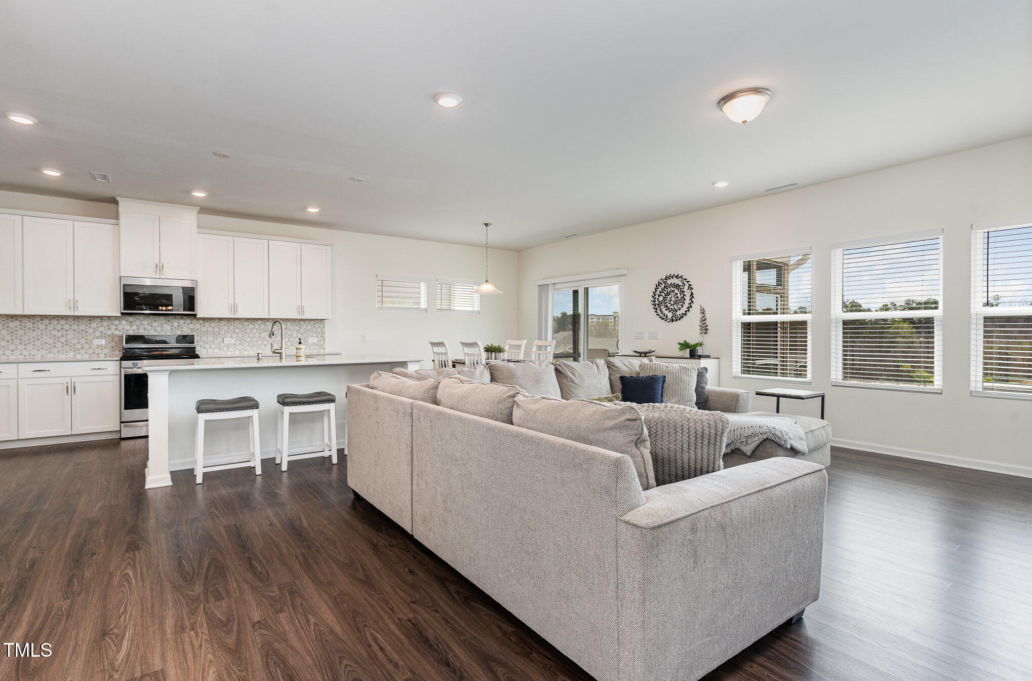 1040 Lippincott Road Durham, NC 27703 - Photo 5 of 43 a living room with furniture and a large window