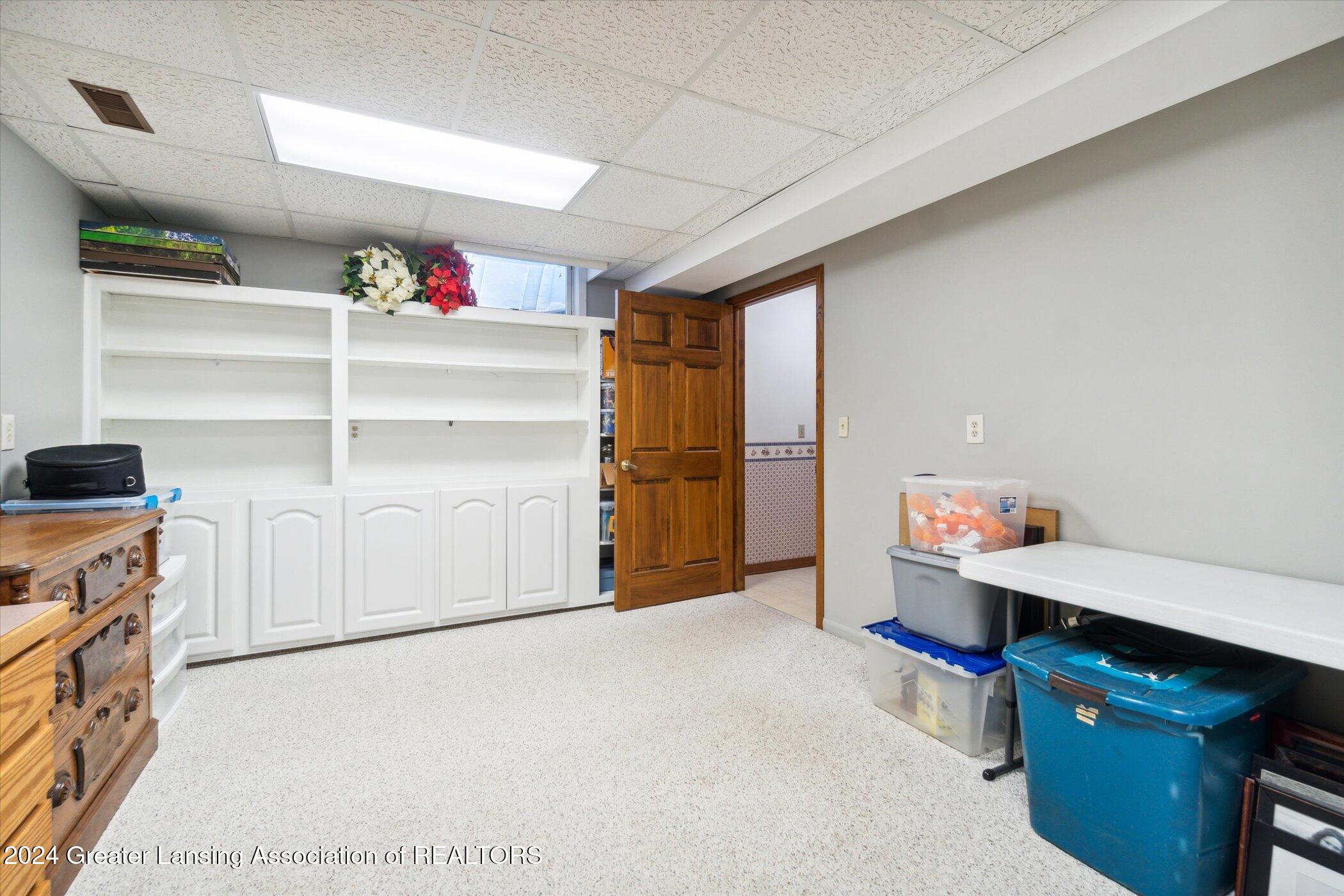14725 Nichols Road Bath, MI 48808 - Photo 38 of 53 Built-ins. Office space