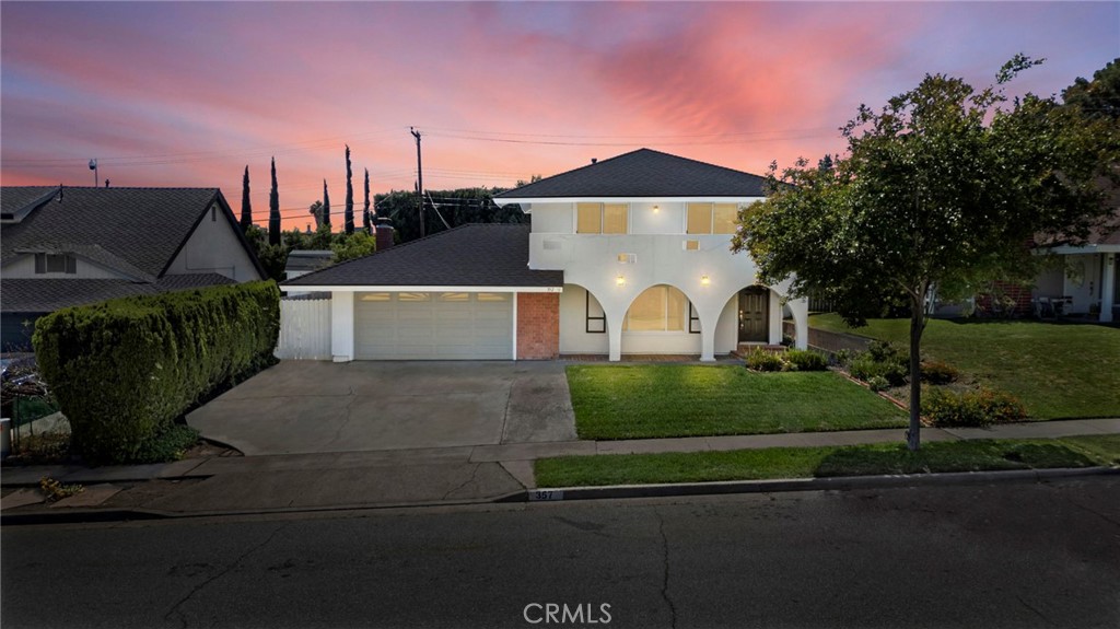 357 Pomelo Avenue Brea, CA 92821 - Photo 1 of 1 a front view of a house with garden