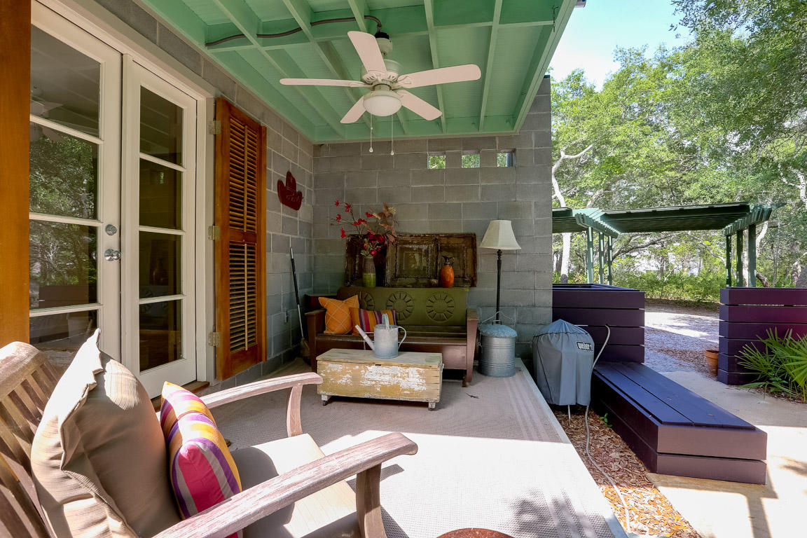 155 South Camp Creek Rd Inlet Beach Inlet Beach, FL 32461 - Photo 7 of 43 a outdoor living space with furniture potted plant and a fireplace