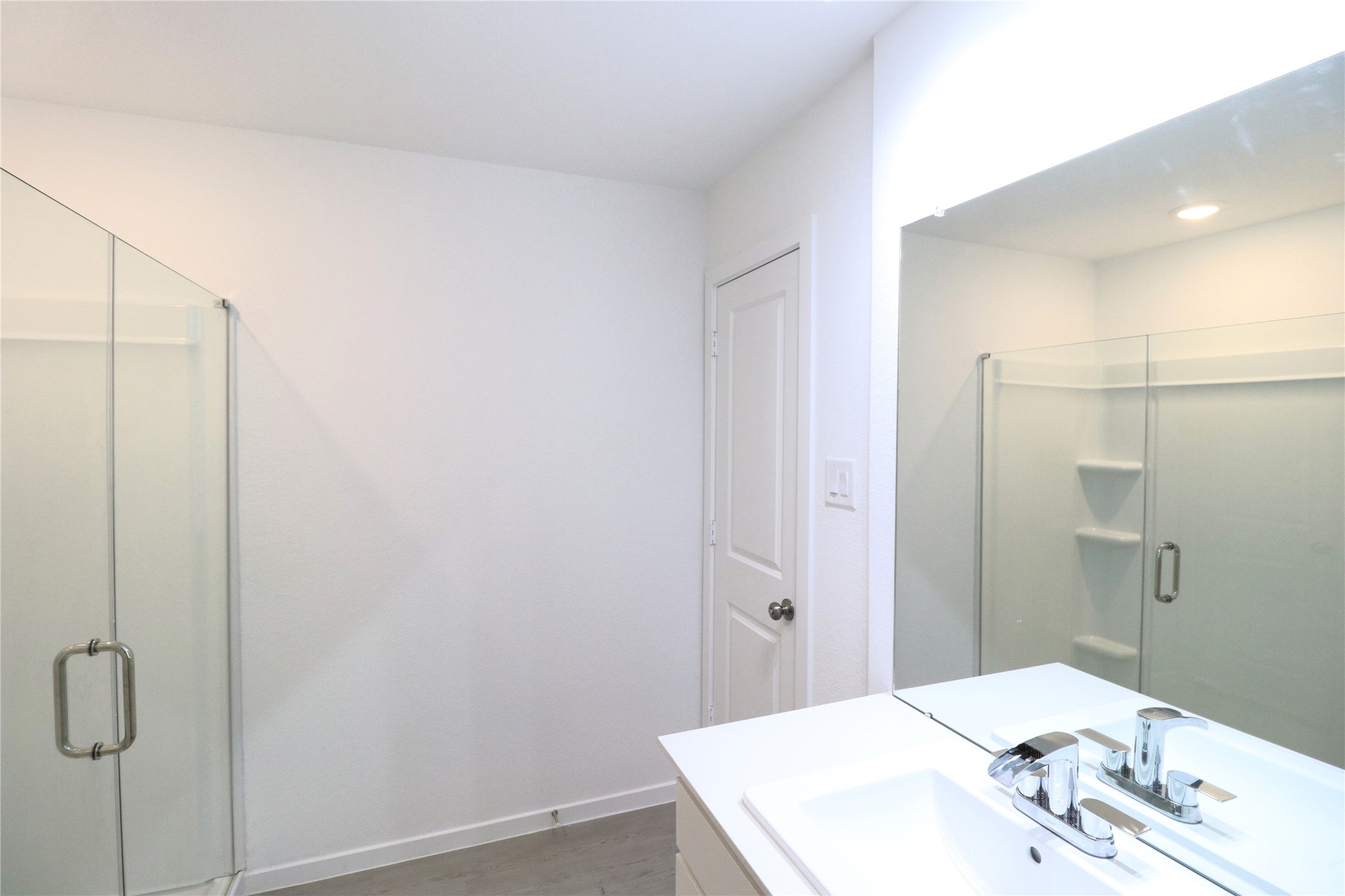 20805 Le Scifo Court New Caney, TX 77357 - Photo 12 of 20 a bathroom with a sink and a mirror