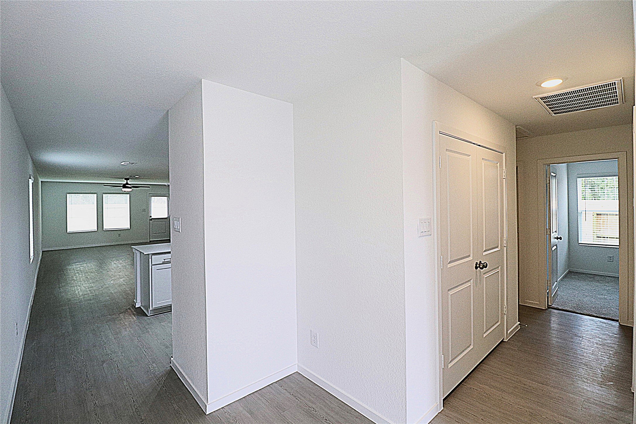 20805 Le Scifo Court New Caney, TX 77357 - Photo 4 of 20 wooden floor in a hall with an entryway