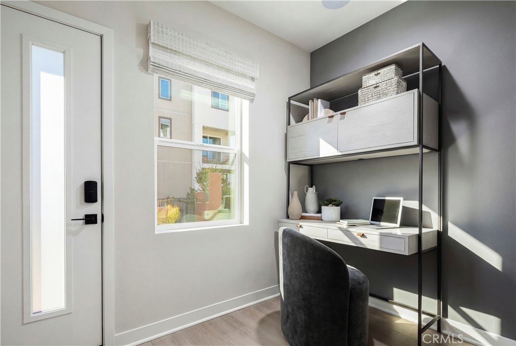 12720 Azure Way, Unit 29 Hawthorne, CA 90250 - Photo 8 of 10 a view of a workspace with furniture and a window