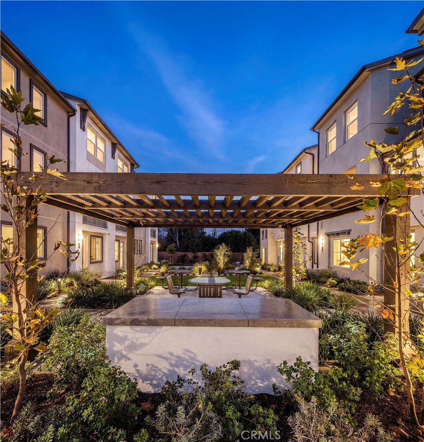 12720 Azure Way, Unit 29 Hawthorne, CA 90250 - Photo 9 of 10 a view of a building with a patio