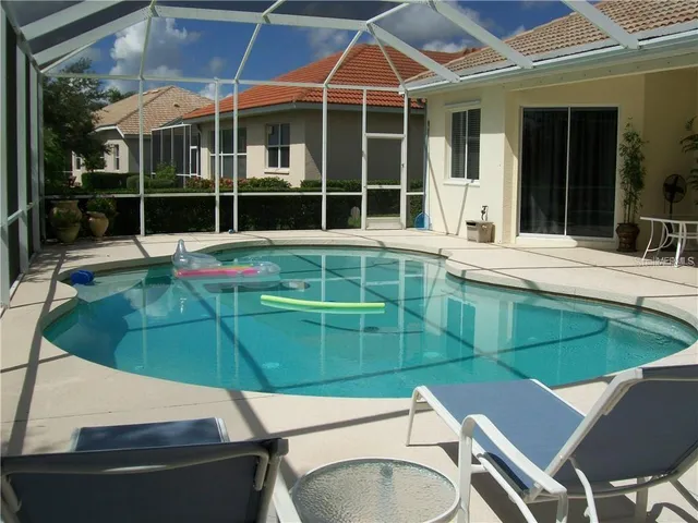 a bathroom with a toilet and a bathtub