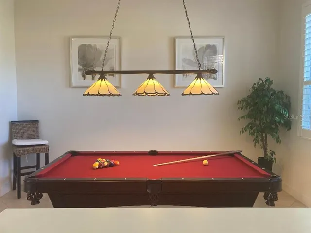 a living room with furniture and windows