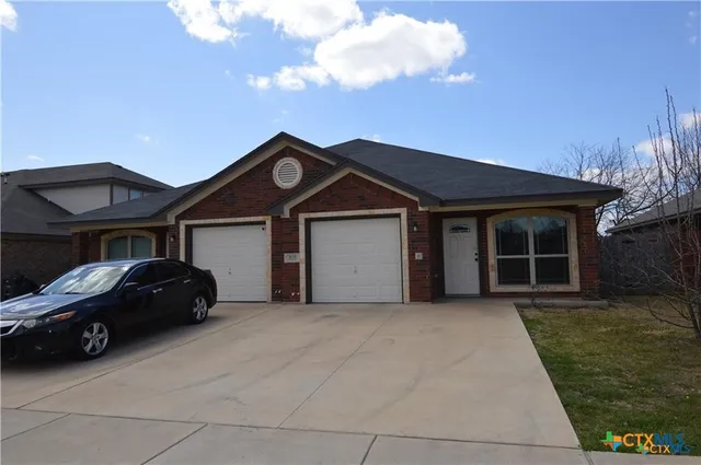 a car parked in front of house