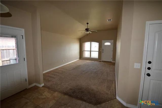 an empty room with windows