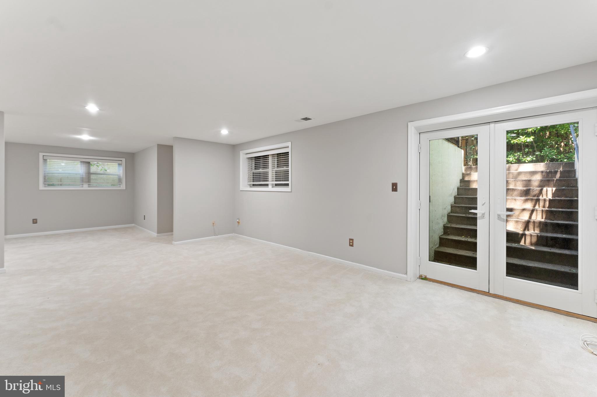 6501 Legend Gate Place Burke, VA 22015 - Photo 41 of 46 basement double doors to back yard