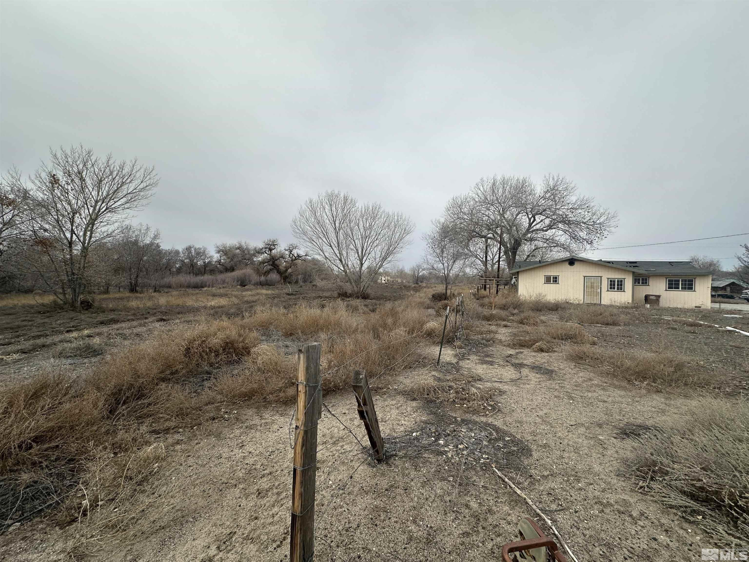 3275 Alcorn Road Fallon, NV 89406 - Photo 25 of 33 a view of a yard in front of a house