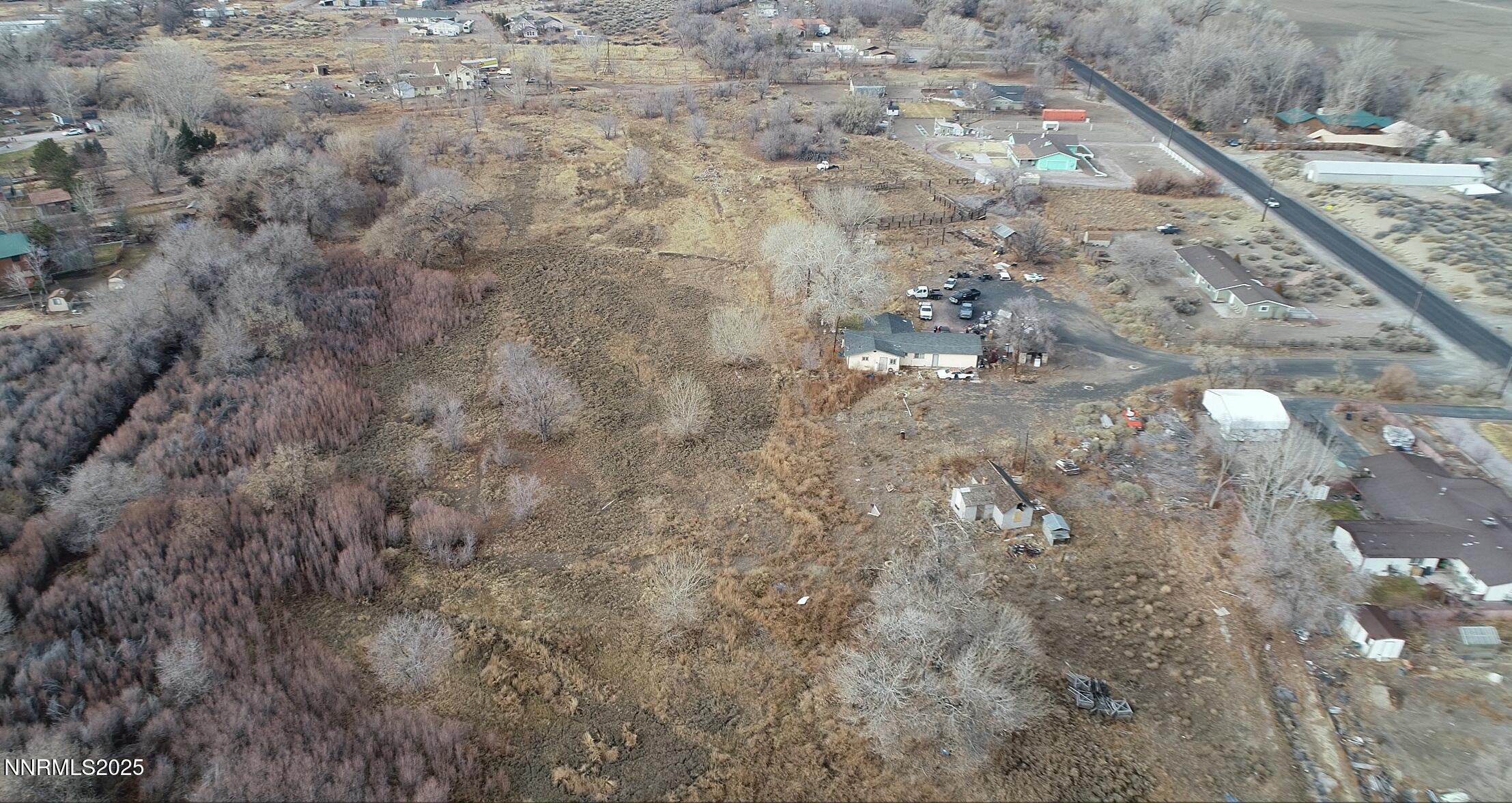 3275 Alcorn Road Fallon, NV 89406 - Photo 8 of 33 a view of a dry yard with trees