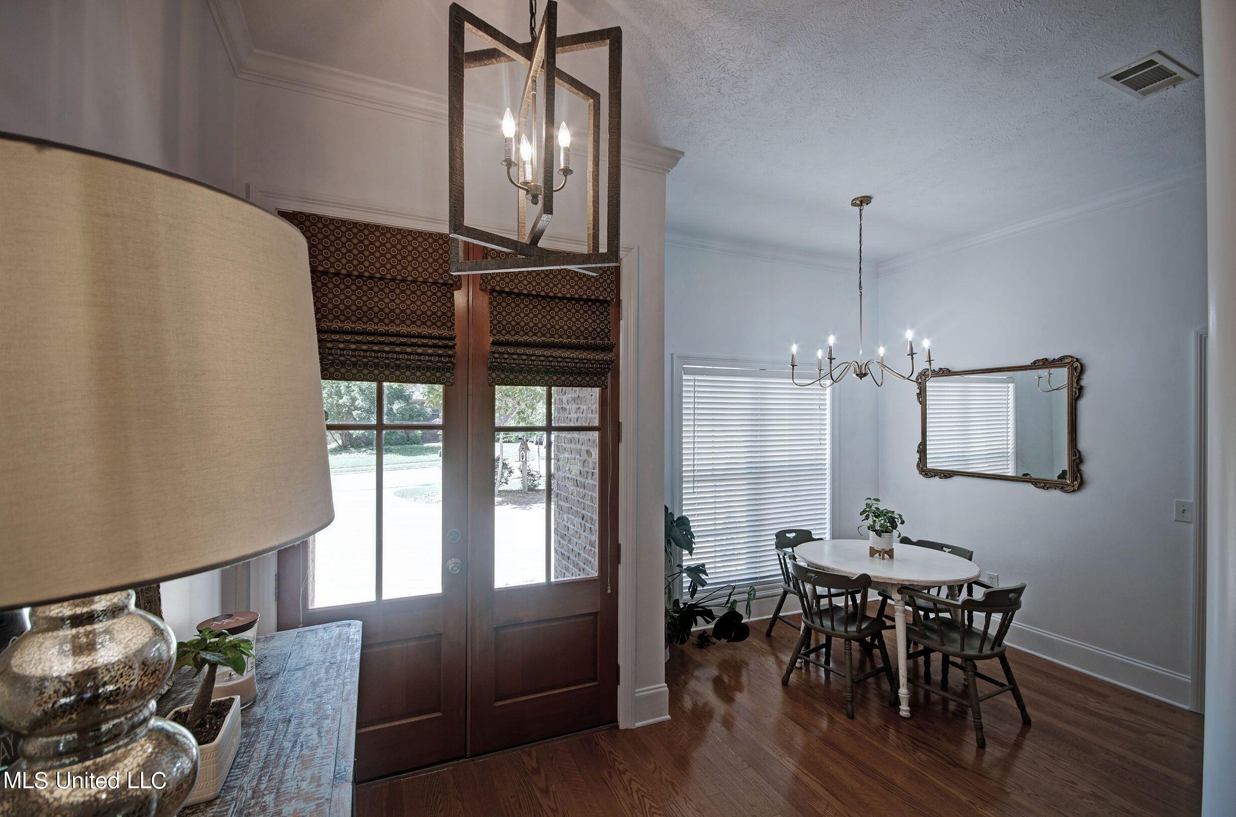 121 Prescott Ridge Madison, MS 39110 - Photo 9 of 33 front door and dining