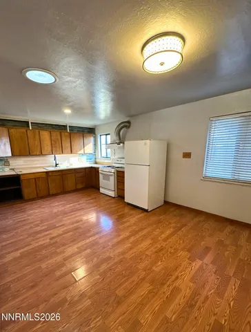 a view of a livingroom with furniture