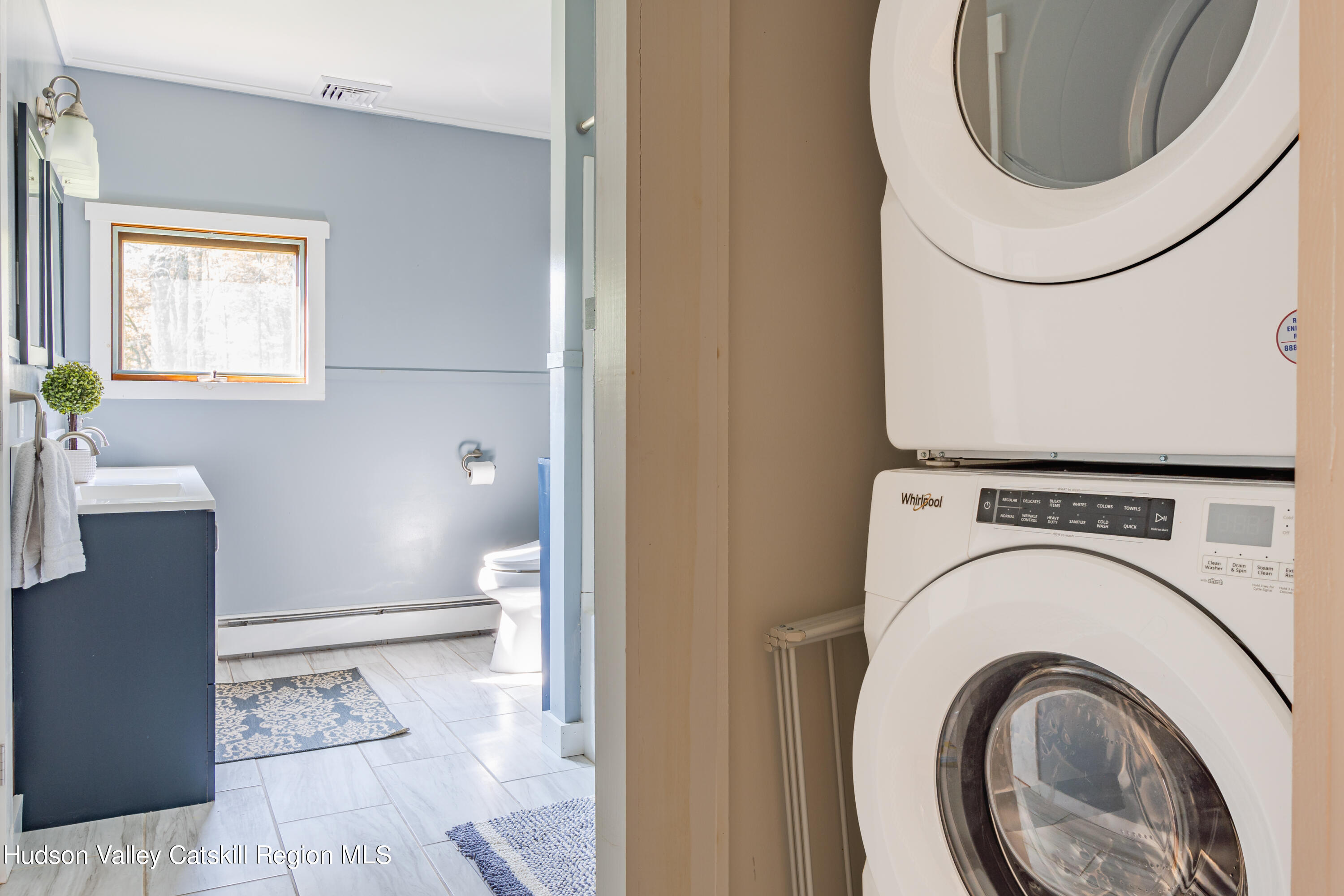 255 High Falls Road Saugerties, NY 12477 - Photo 16 of 33 a bathroom with a toilet and a rug