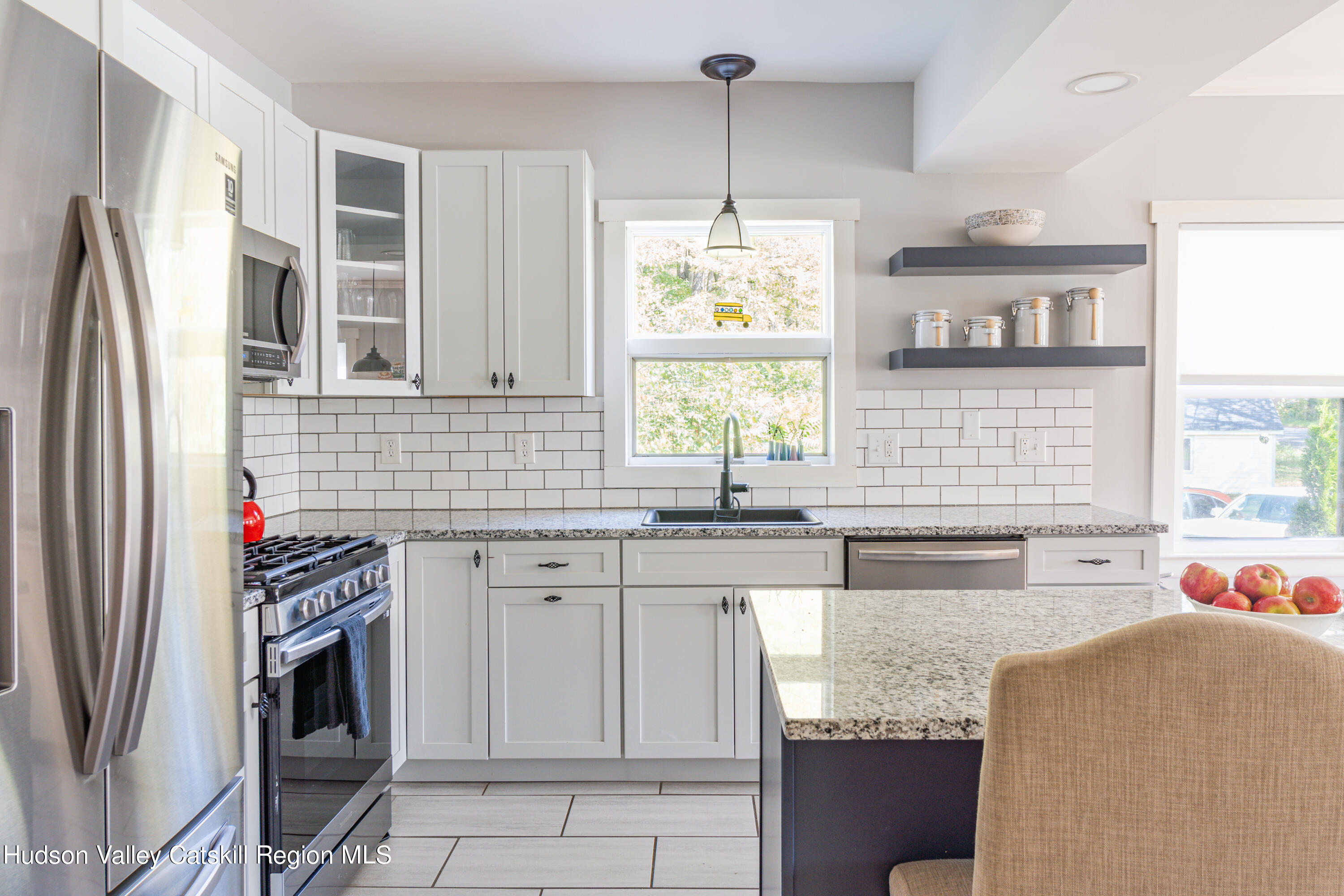 255 High Falls Road Saugerties, NY 12477 - Photo 6 of 33 a kitchen with stainless steel appliances granite countertop a sink and a refrigerator