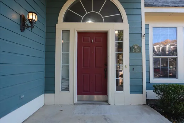 a front view of a house with a porch