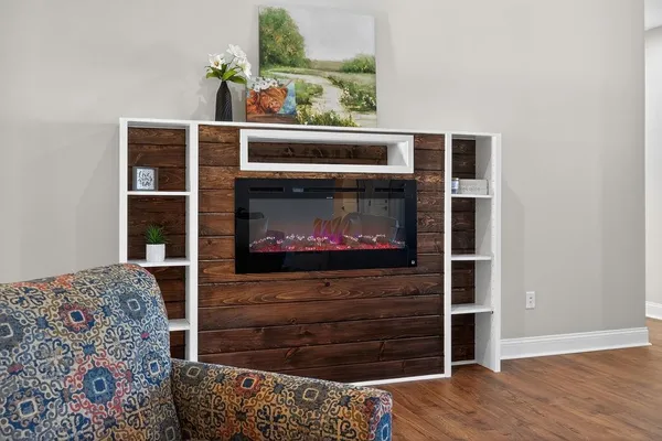 a spacious bedroom with a bed and window