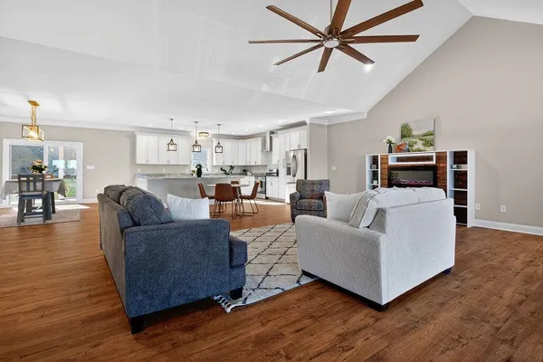 a workspace with furniture and wooden floor