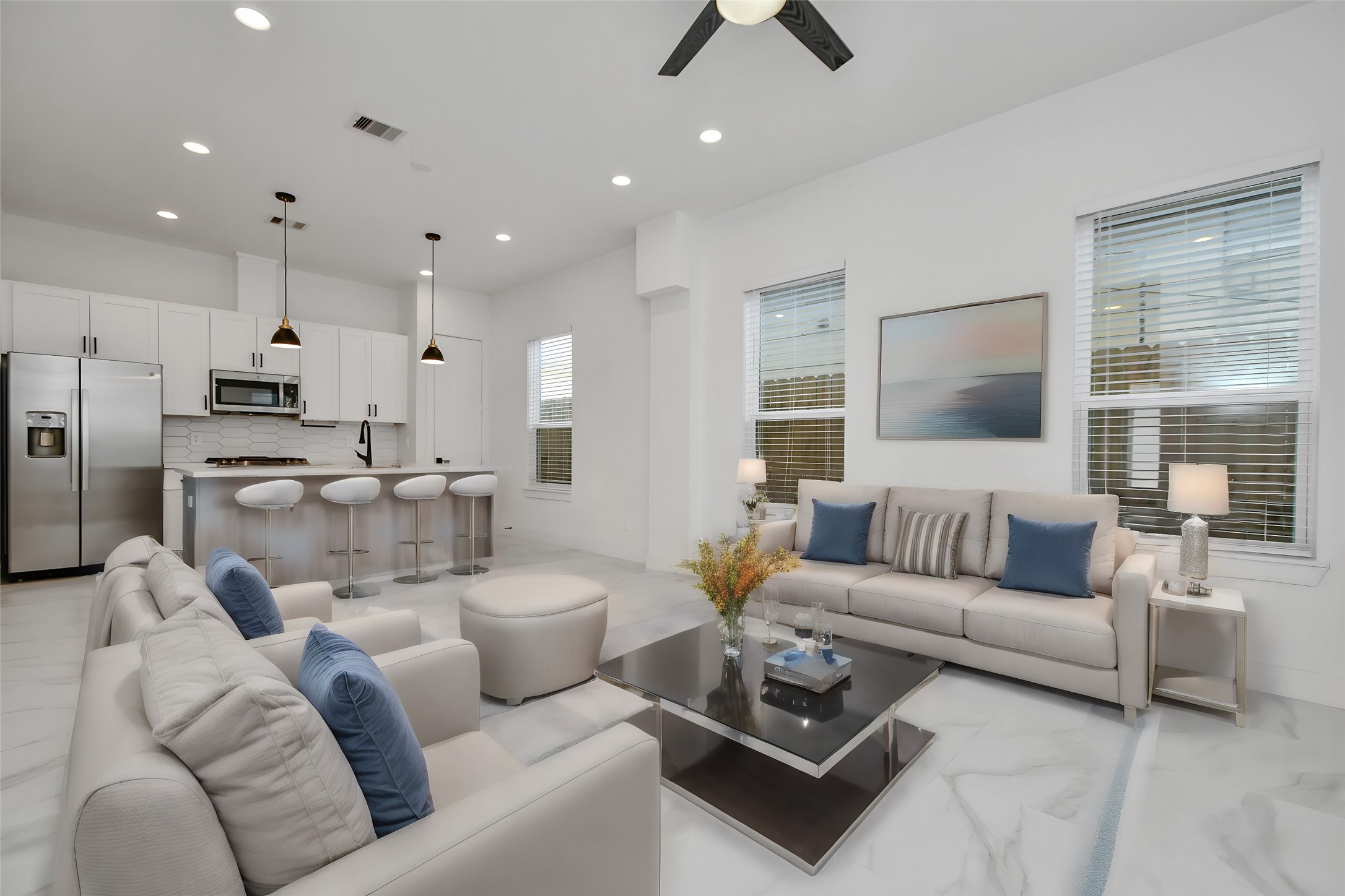 853 Mansfield Street, Unit E Houston, TX 77091 - Photo 2 of 47 a living room with furniture and a large window