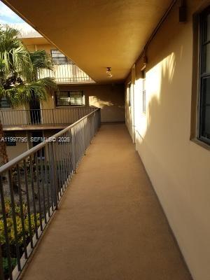 10425 Southwest 112th Avenue, Unit 211 Miami, FL 33176 - Photo 12 of 18 a view of a porch