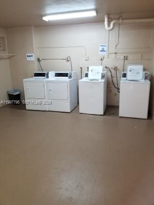 10425 Southwest 112th Avenue, Unit 211 Miami, FL 33176 - Photo 15 of 18 a utility room with dryer and washer