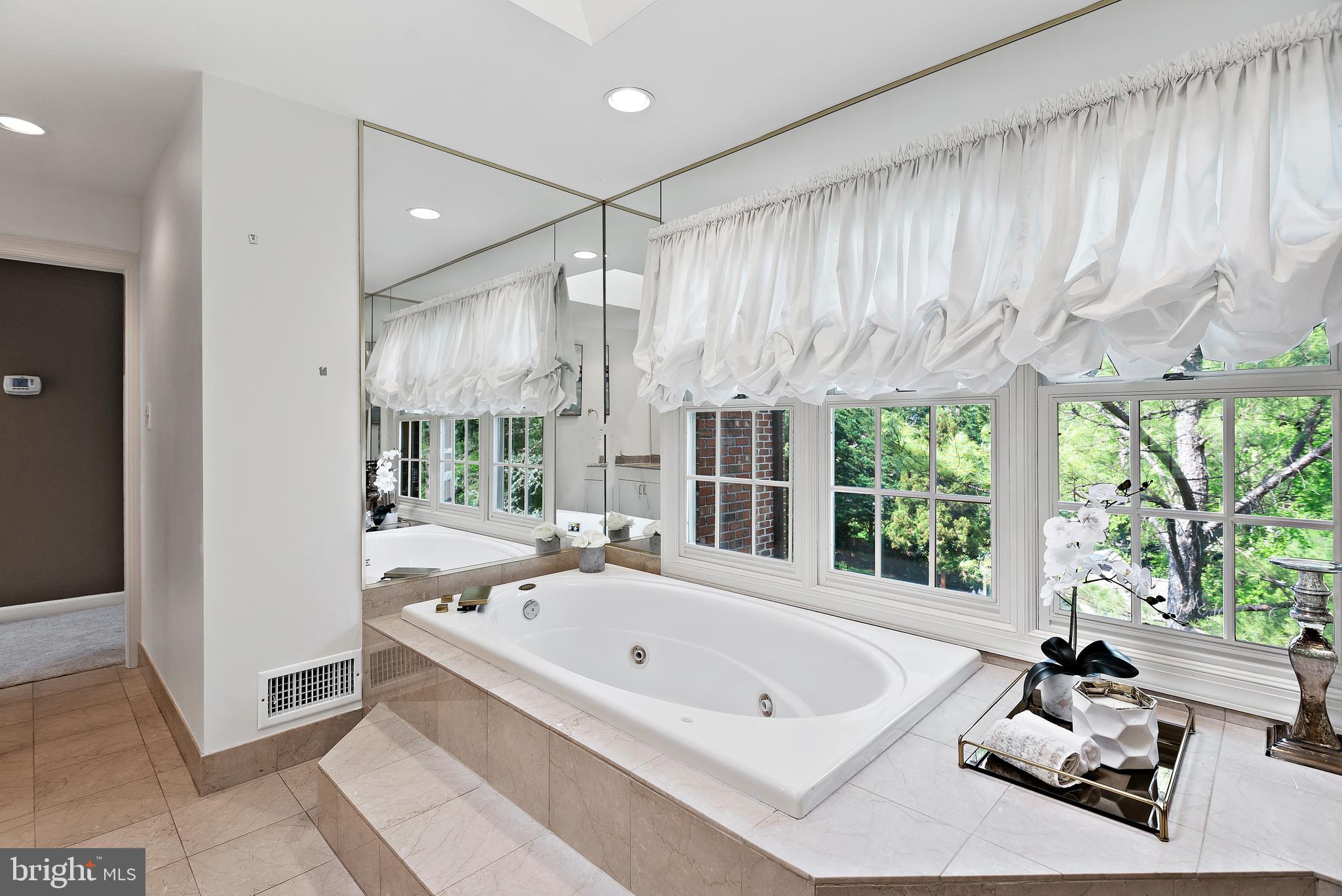 9621 River Road Potomac, MD 20854 - Photo 92 of 120 Jacuzzi tub in owner's bath overlooking pool
