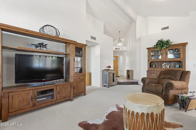 a bathroom with a bathtub and a mirror